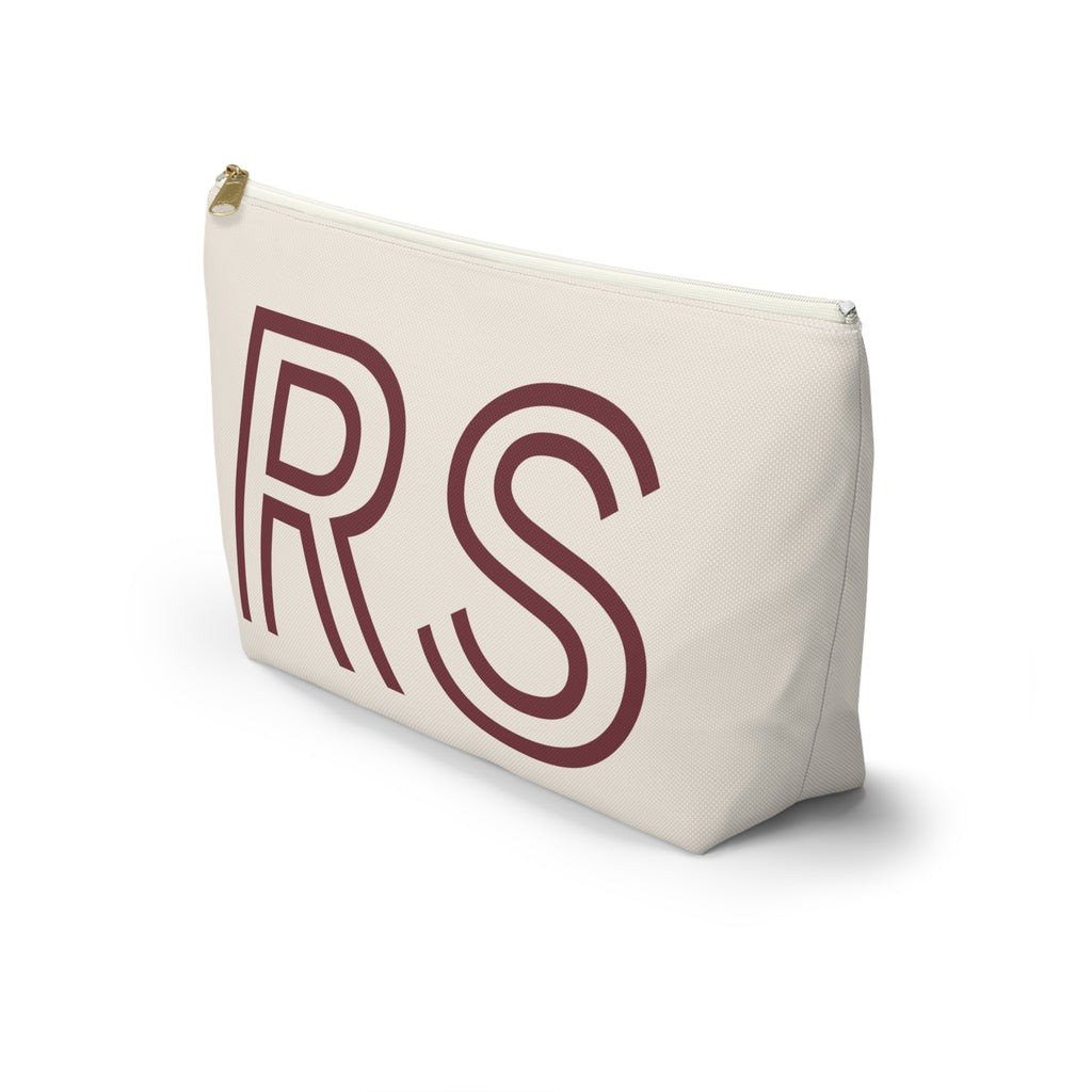 Side view of the cream RS monogram personalized makeup bag