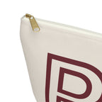 Close-up of the gold zipper pull on the cream personalized makeup bag