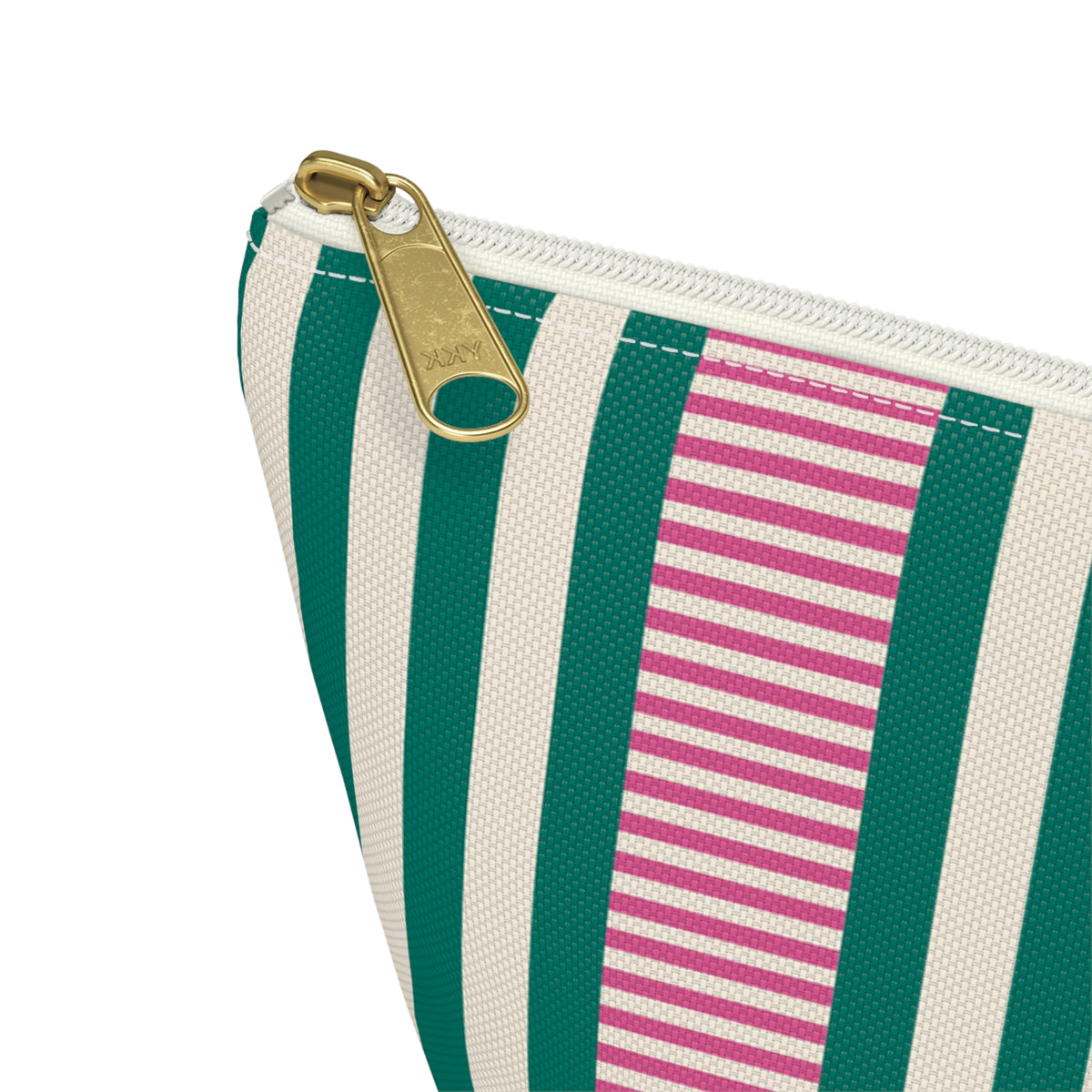 Close-up of the green stripes, pink pinstripes and gold zipper pull on the makeup bag
