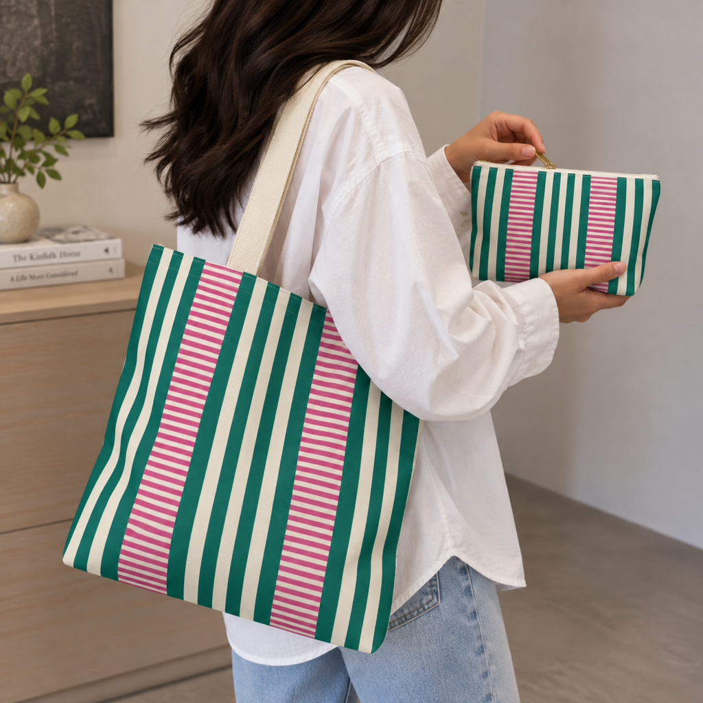 Model holding the Emerald Green Pink Striped tote bag with the matching makeup bag