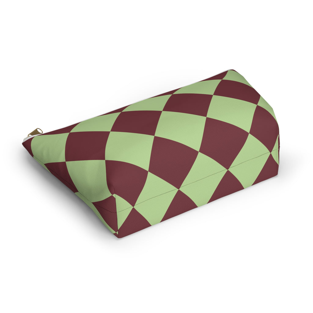 Side view of the green burgundy diamond checkered makeup bag lying down
