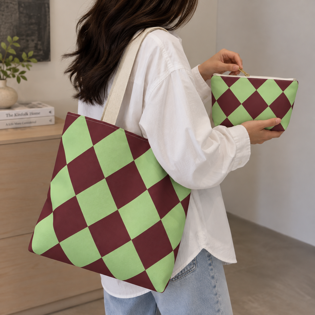 Green burgundy checkered tote bag on the shoulder with a matching makeup bag in hand