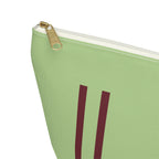 Close-up of the gold zipper pull and burgundy lines on the green personalized makeup bag