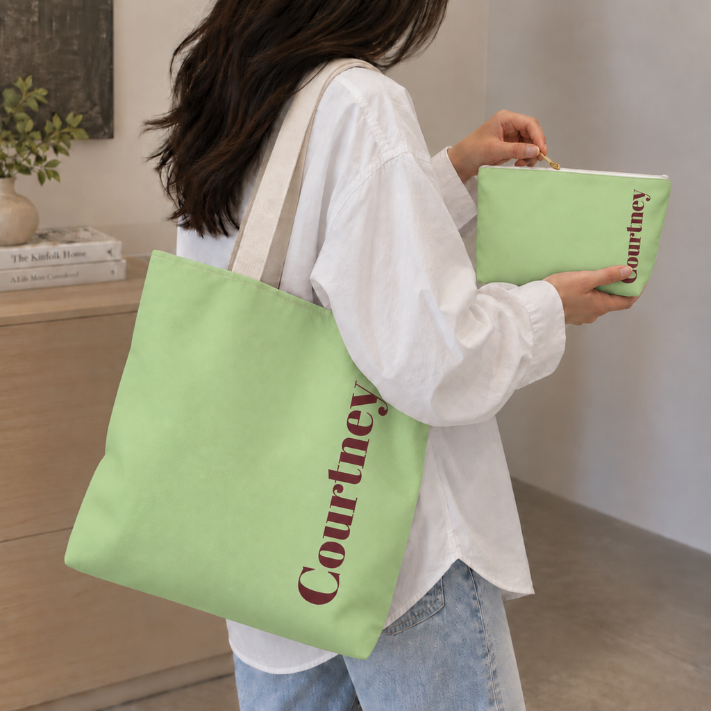 Woman carrying the Green Burgundy Name personalized tote bag on her shoulder with the matching makeup bag