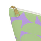 Close-up of the gold zipper pull on the green lavender half circle makeup bag