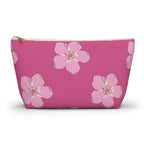 Hot pink blossom floral makeup bag with gold zipper pull, front view on white background