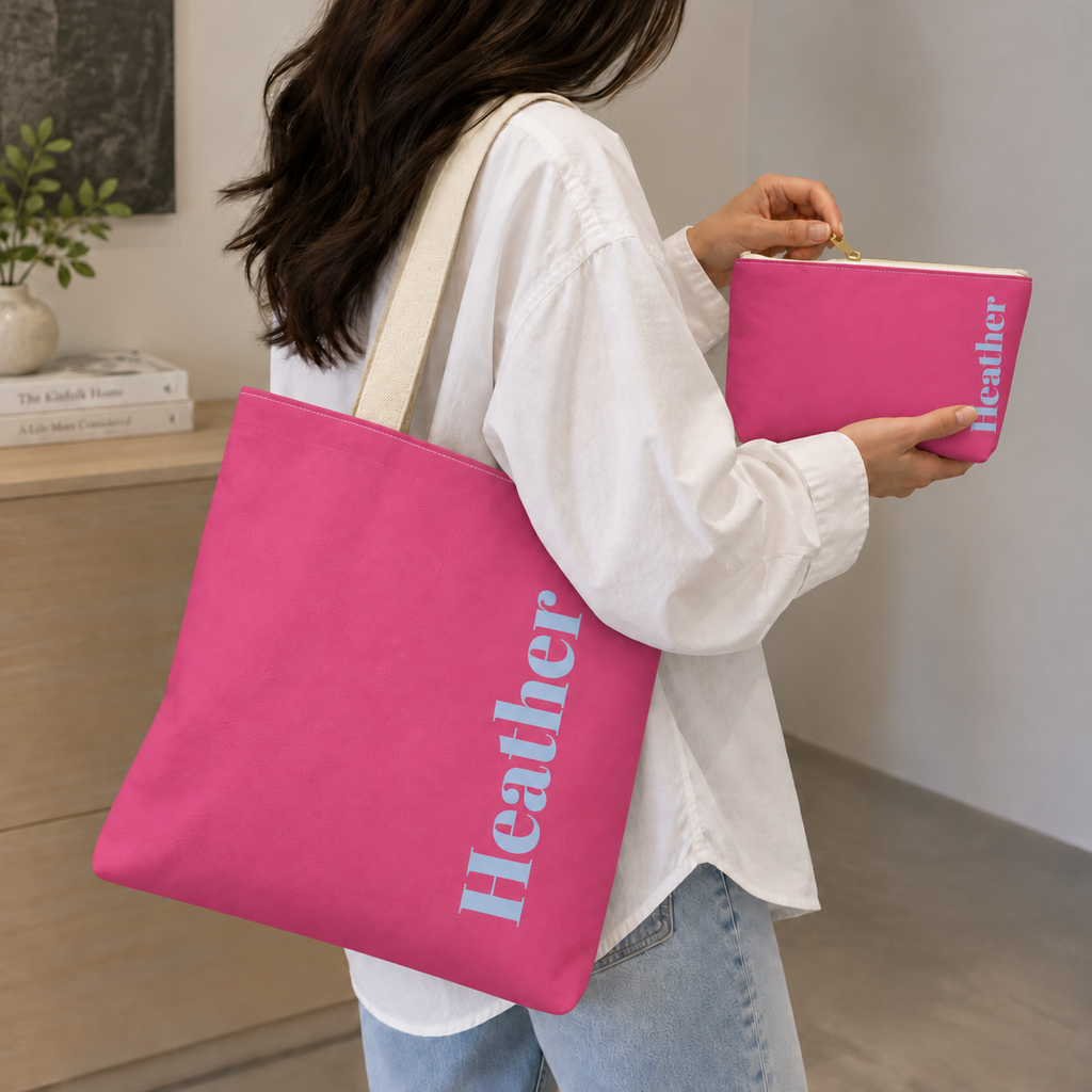 Woman carrying the Hot Pink Blue Name personalized tote bag on her shoulder with the matching makeup bag