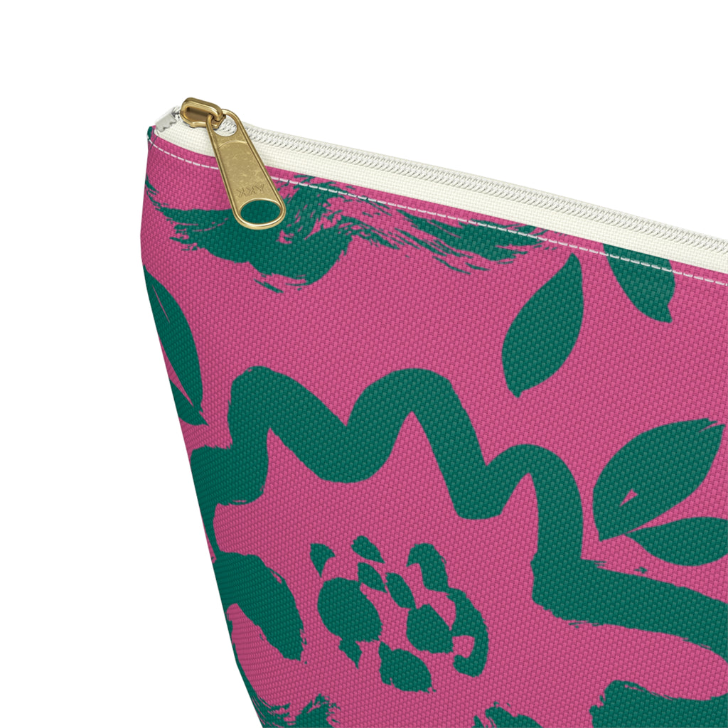 Close-up of the gold zipper pull on the hot pink green floral makeup bag