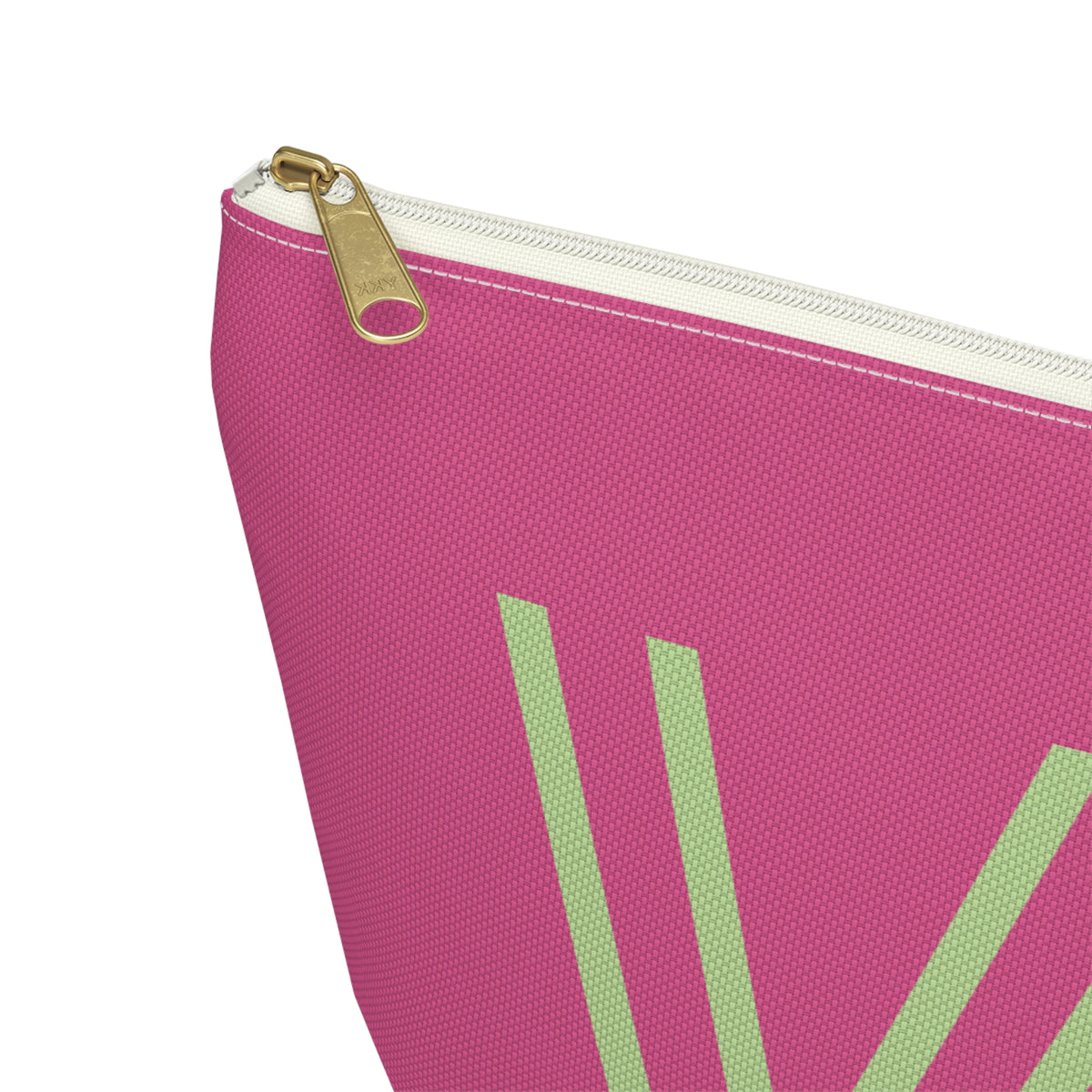 Close-up of the gold zipper pull and green letter on the hot pink personalized makeup bag