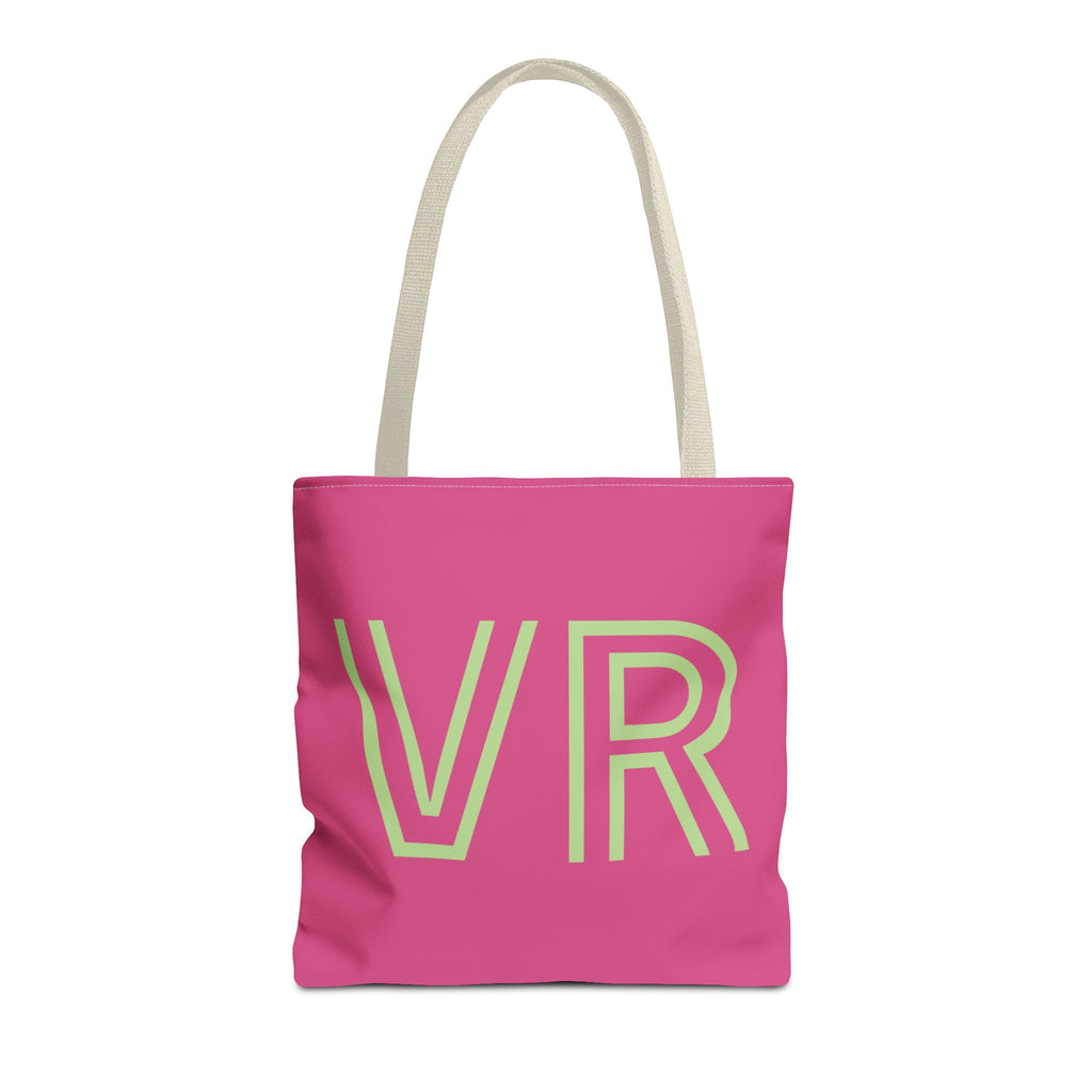 Hot pink personalized tote bag with pale green outlined VR initials and cream handles on a white background