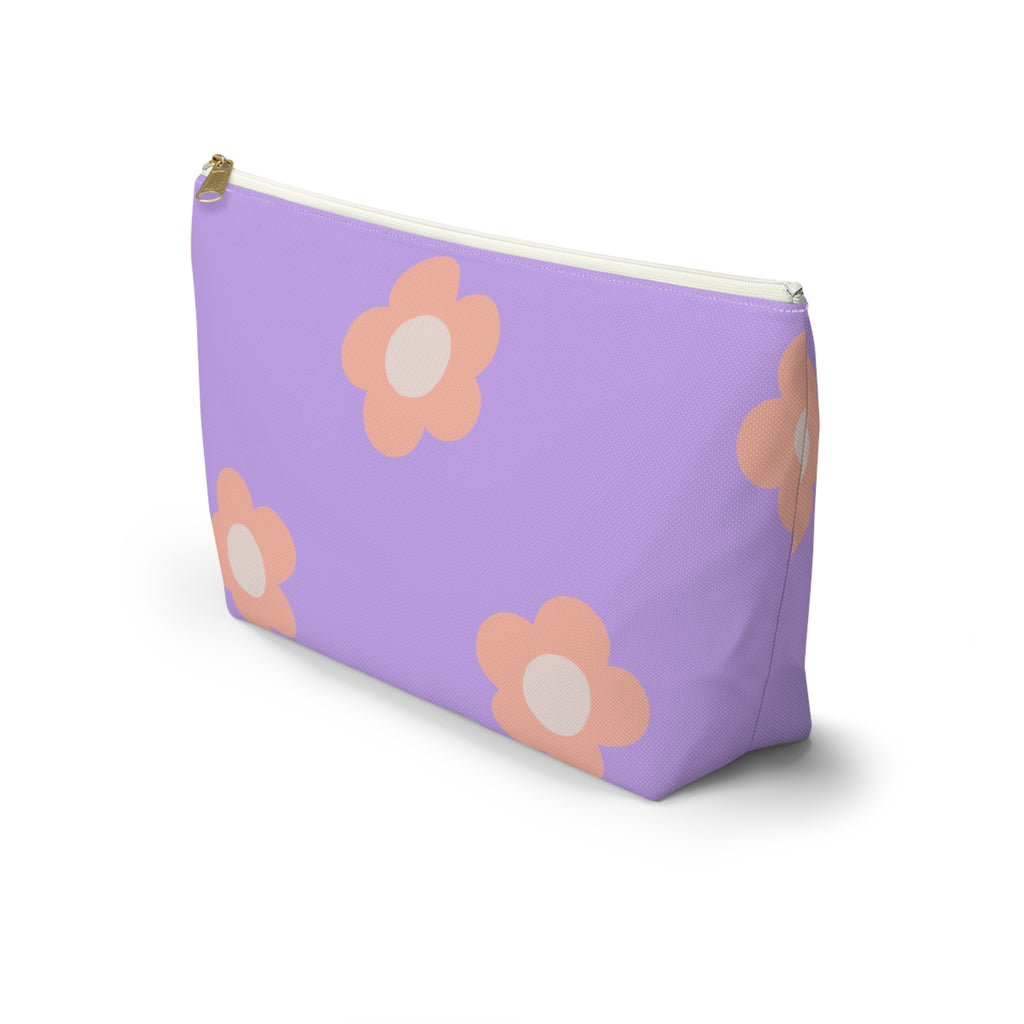 Side view of the lavender peach daisy makeup bag with T-shaped bottom