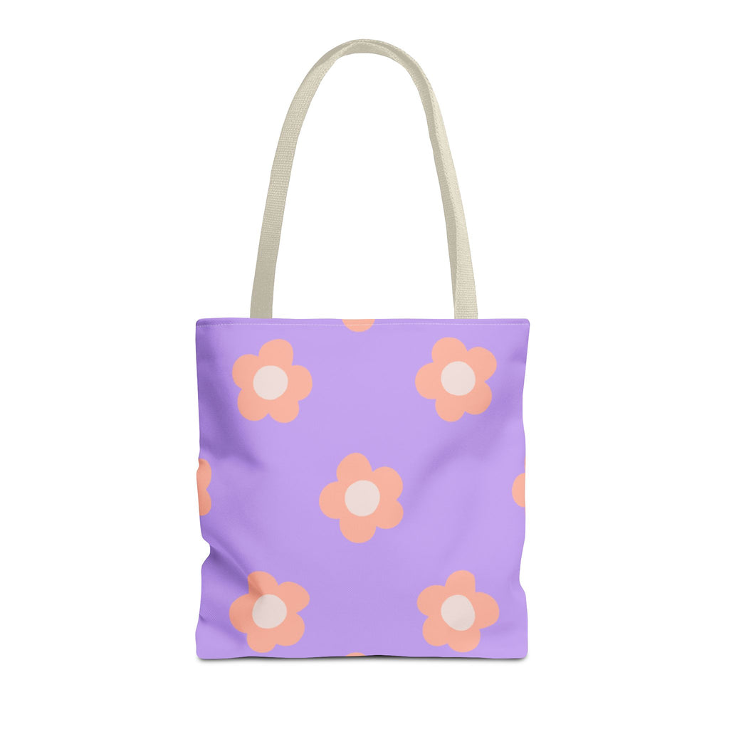 Lavender tote bag with peach daisies and cream handles on a white background