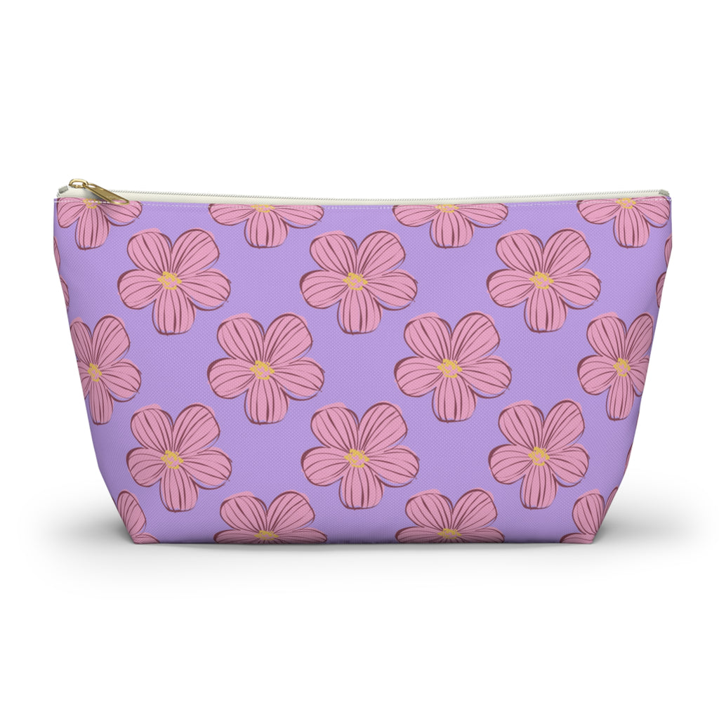Lavender pink blossom floral makeup bag with gold zipper pull, front view on white background