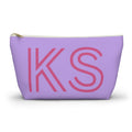 Lavender personalized makeup bag with pink outlined KS initials and gold zipper pull on a white background
