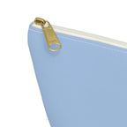 Close-up of the gold zipper pull on the Light Blue Burgundy Name personalized makeup bag