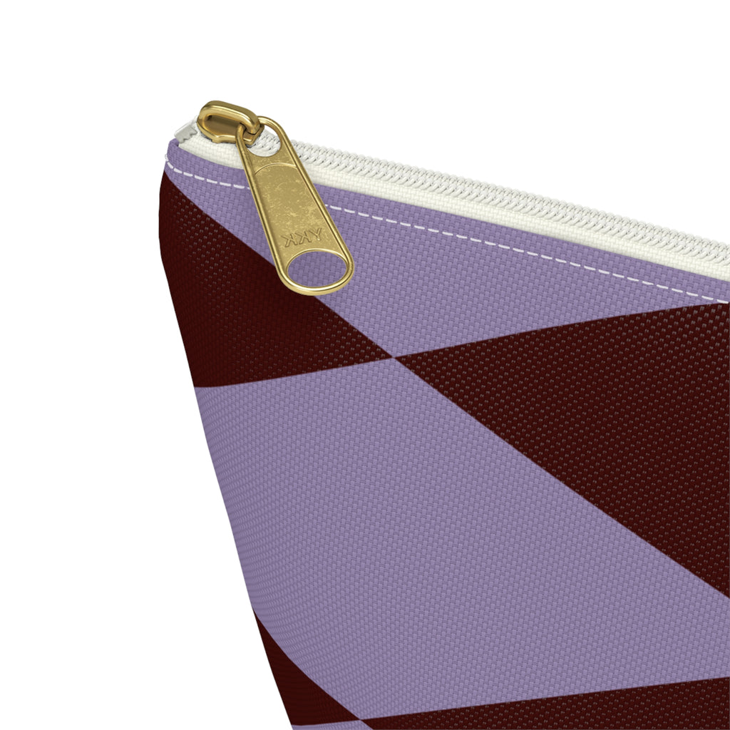 Close-up of the gold zipper pull on the lilac burgundy diamond makeup bag