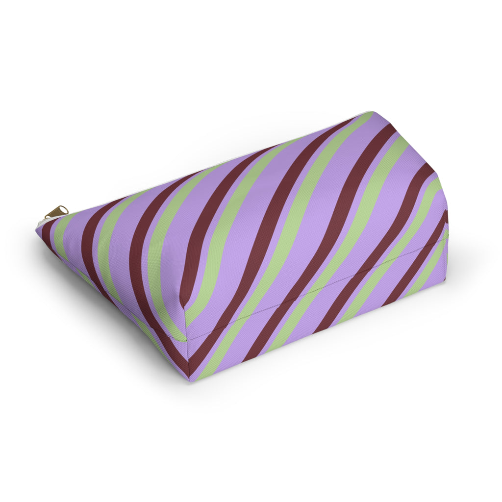 Lilac green striped cosmetic bag lying on its side