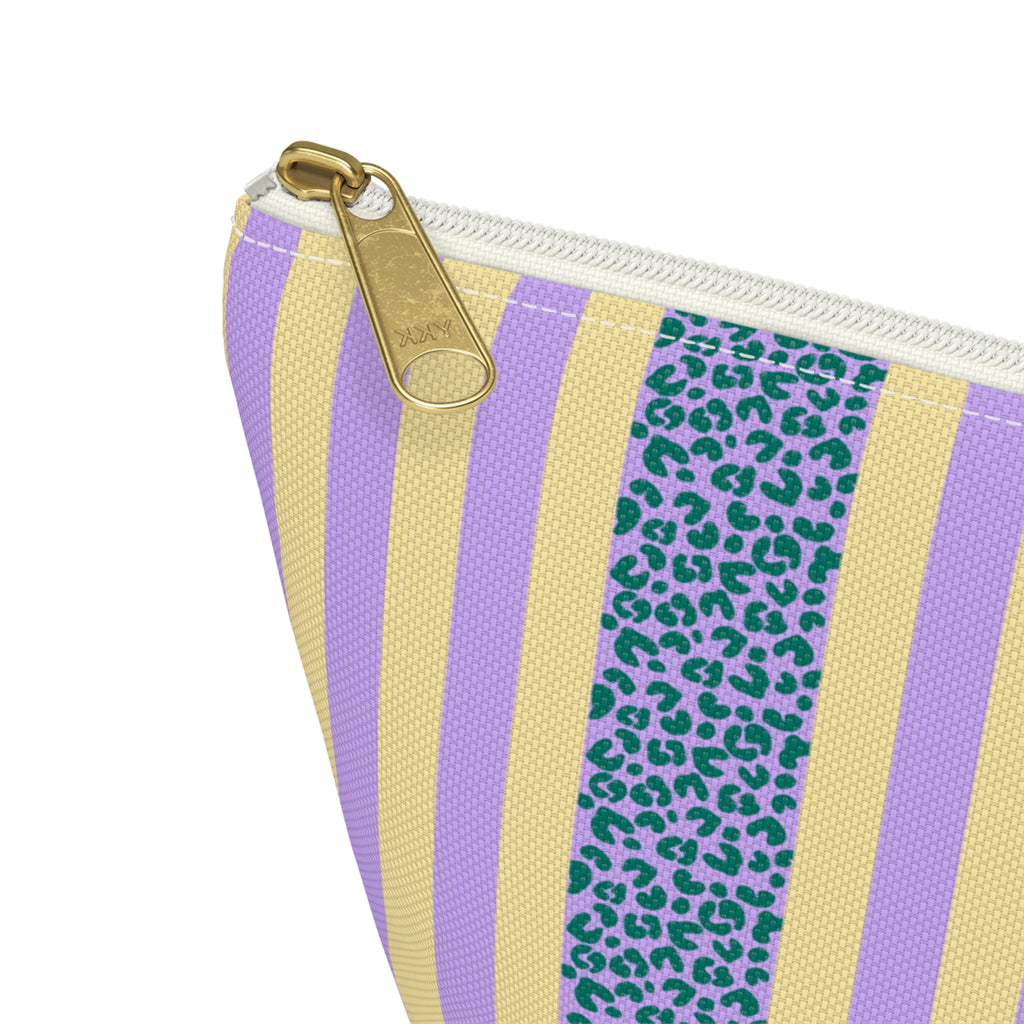 Close-up of the lilac and yellow stripes, blue leopard print band and gold zipper pull