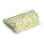 Side view of the lime green leopard print makeup bag lying down