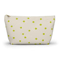Lime green polka dot makeup bag with gold zipper pull, front view