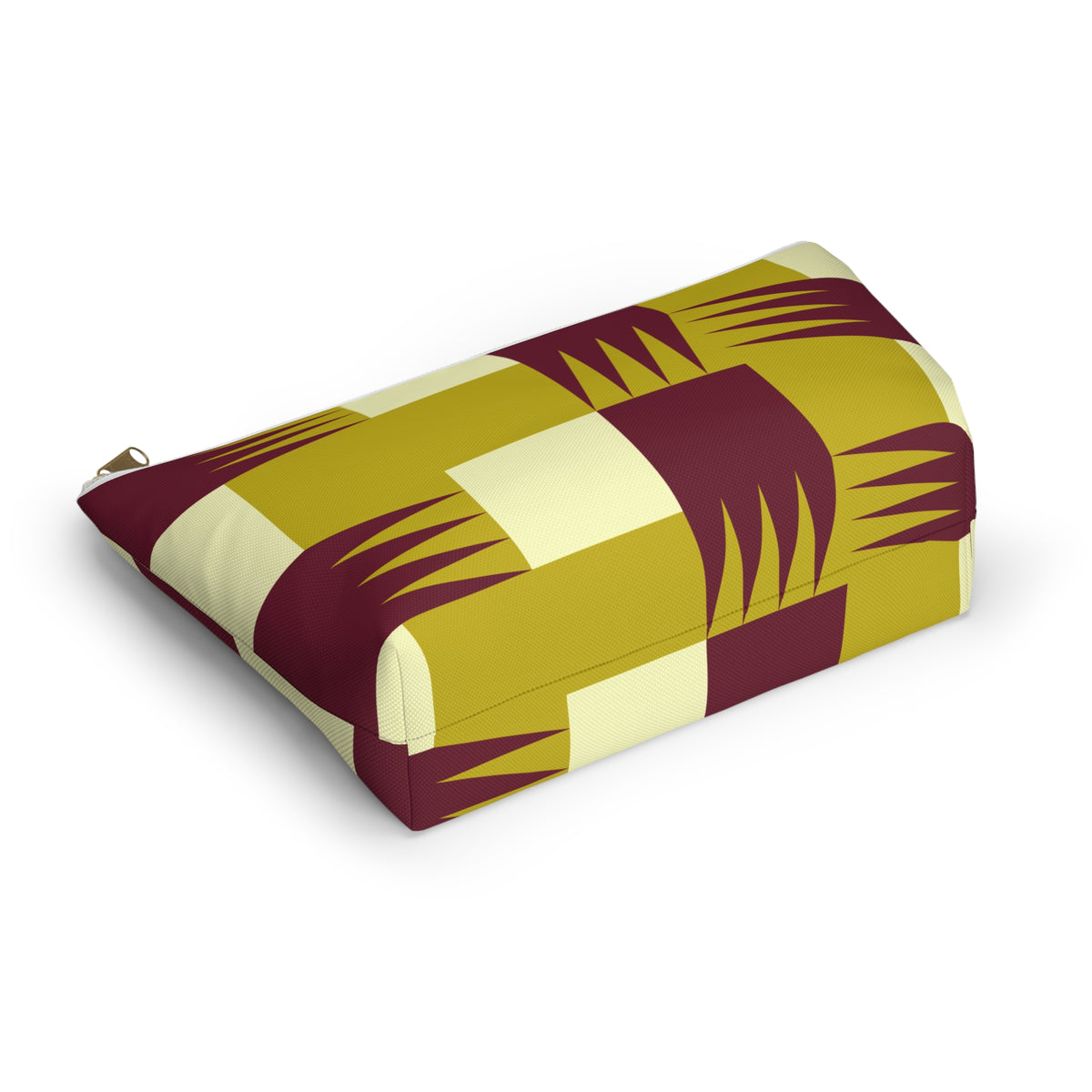 Geometric makeup bag lying on its side showing mustard and burgundy blocks