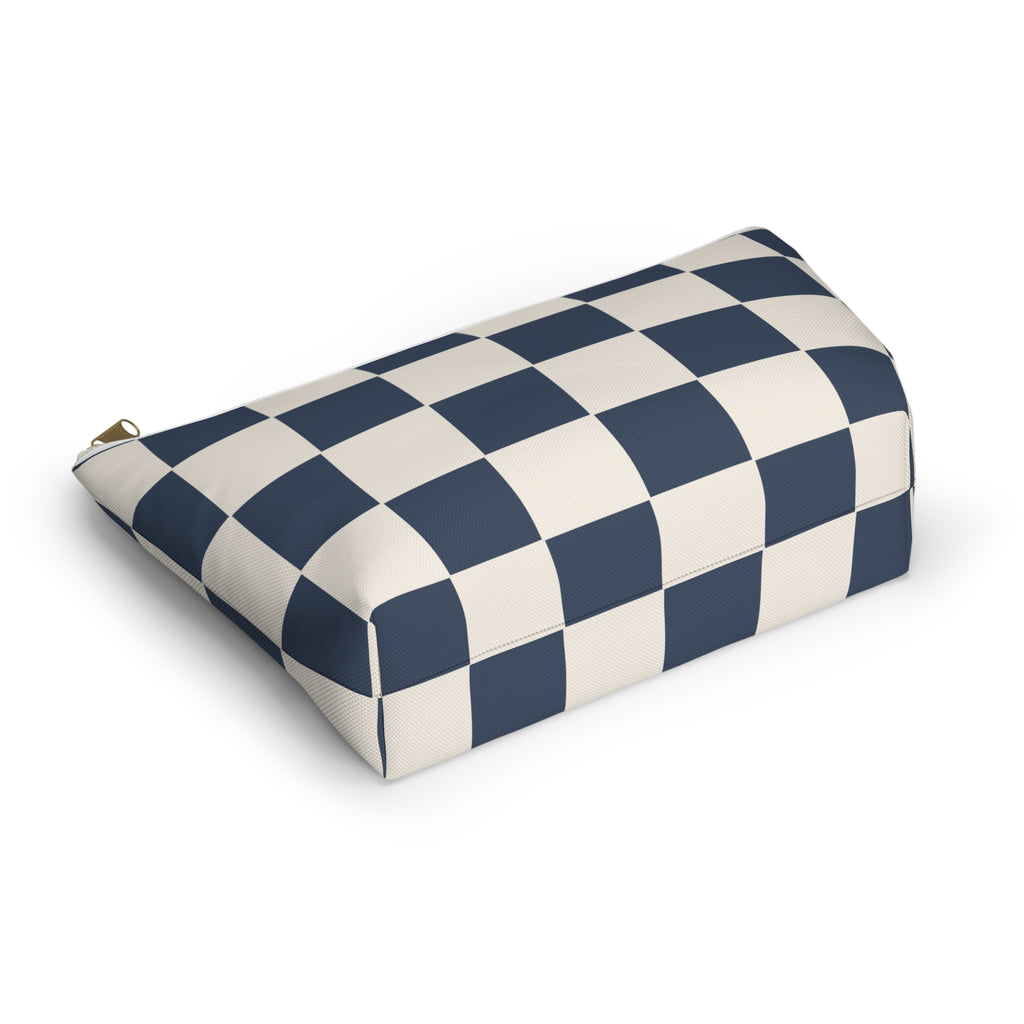 Navy cream checkered makeup bag lying flat at an angle