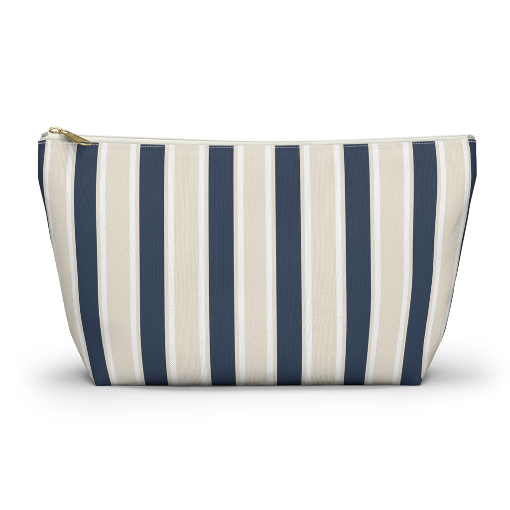 Navy cream striped makeup bag with T-bottom and gold zipper pull, front view