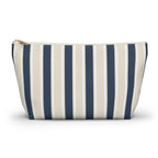 Navy cream striped makeup bag with T-bottom and gold zipper pull, front view