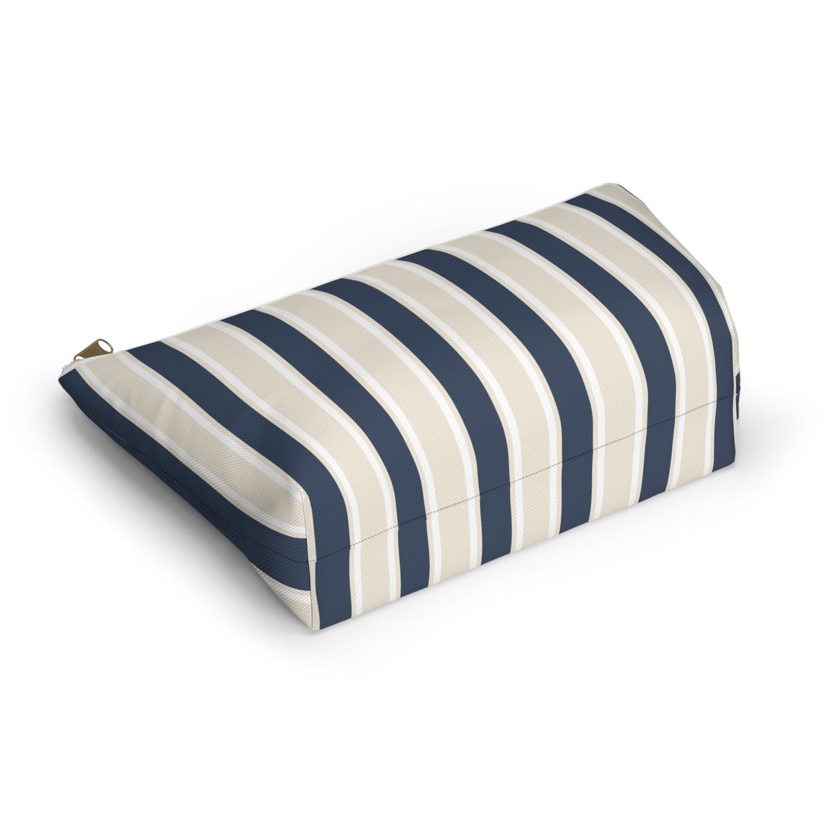 Navy cream striped makeup bag lying on its side showing the stripe pattern
