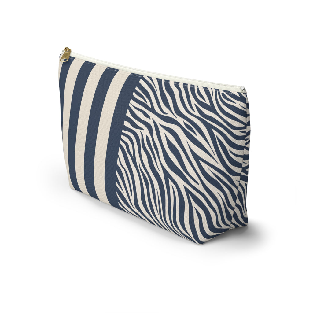 Side view of the navy and cream zebra striped makeup bag