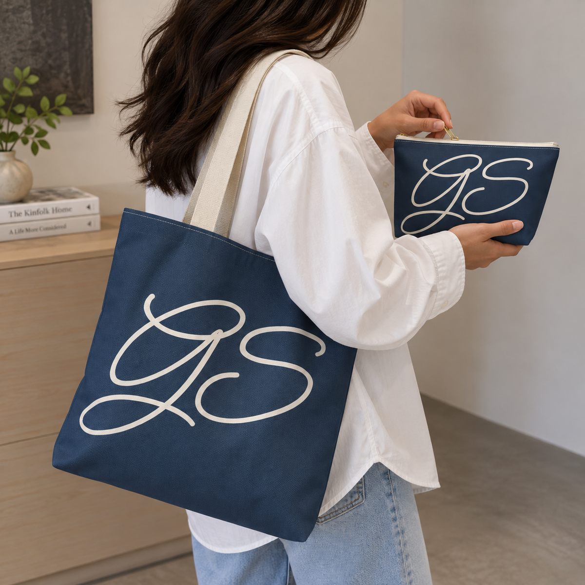 Woman carrying the matching tote bag and Navy White Monogram personalized makeup bag