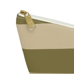 Close-up of the gold zipper pull on the olive beige geometric makeup bag