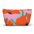 Orange poppy floral makeup bag with gold zipper pull on a white background