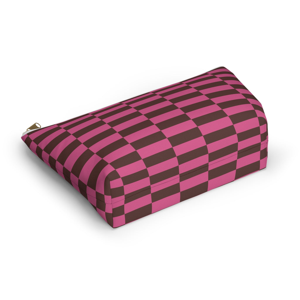 Pink brown checkered makeup bag lying on its side