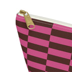 Close-up of the gold zipper pull on the pink brown checkered makeup bag