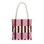 Pink burgundy cream striped tote bag with beige handles, front view on white background