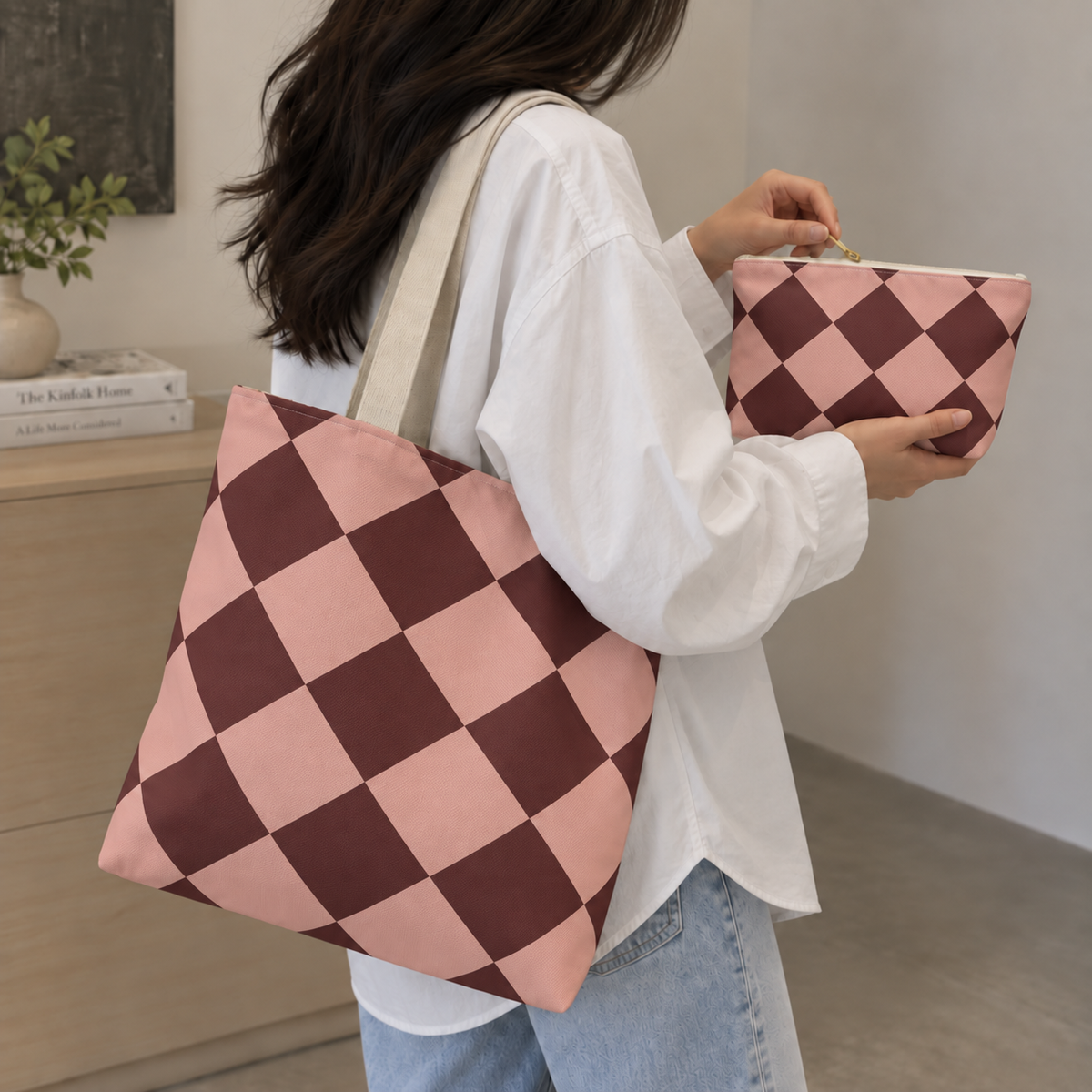 Pink burgundy checkered makeup bag carried with the matching tote bag
