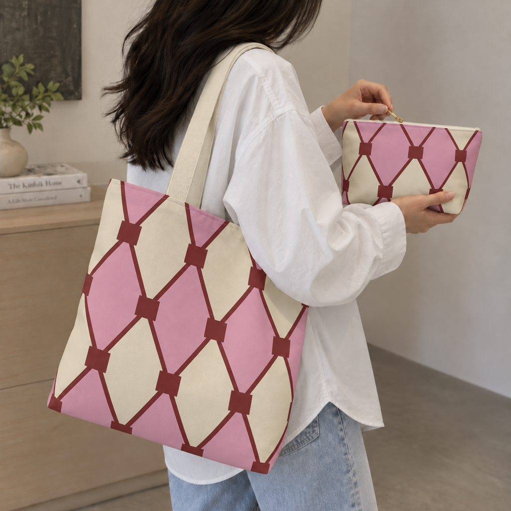Woman with a diamond pattern tote bag and matching pink cream makeup bag in hand