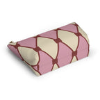 Side view of the pink cream diamond pattern makeup bag lying down