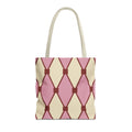 Pink cream diamond pattern tote bag with beige handles on a white background