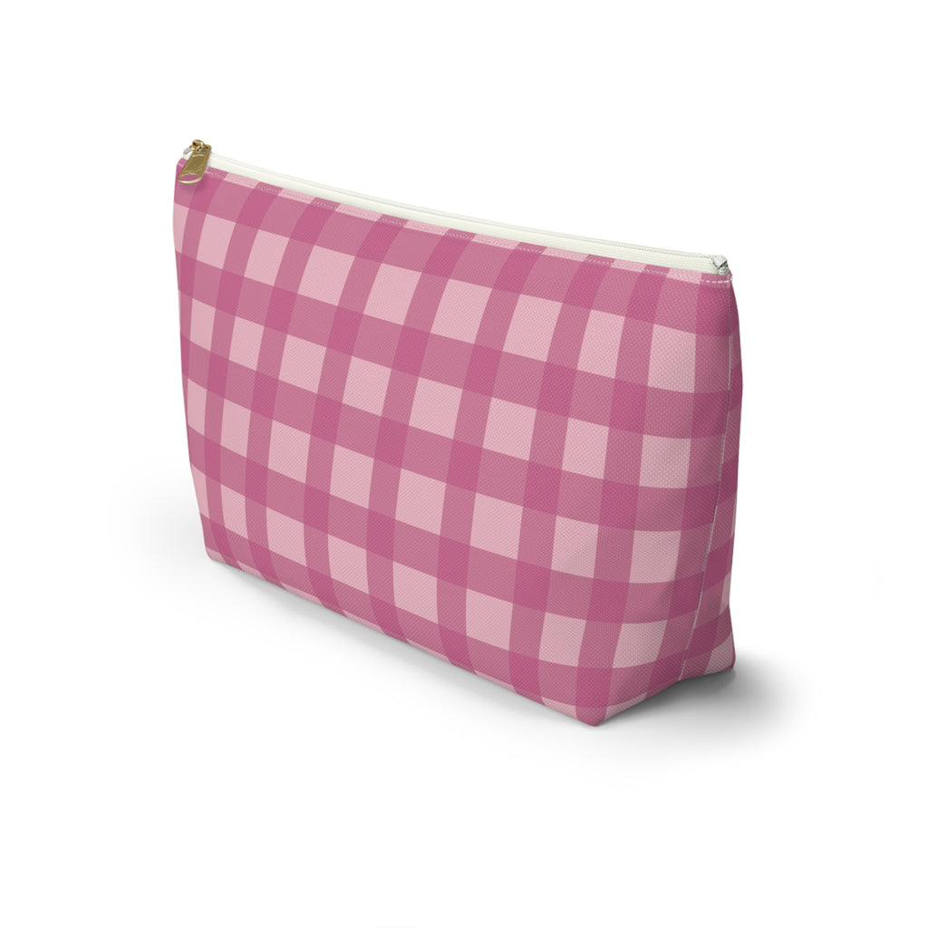 Side view of the pink gingham makeup bag with T-shaped bottom