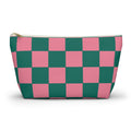 Pink and green checkered makeup bag with gold zipper pull on a white background
