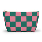 Pink and green checkered makeup bag with gold zipper pull on a white background