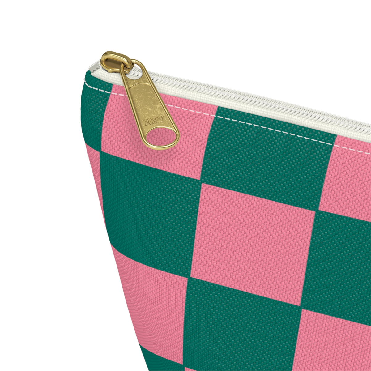 Close-up of the gold zipper pull on the pink green checkered makeup bag