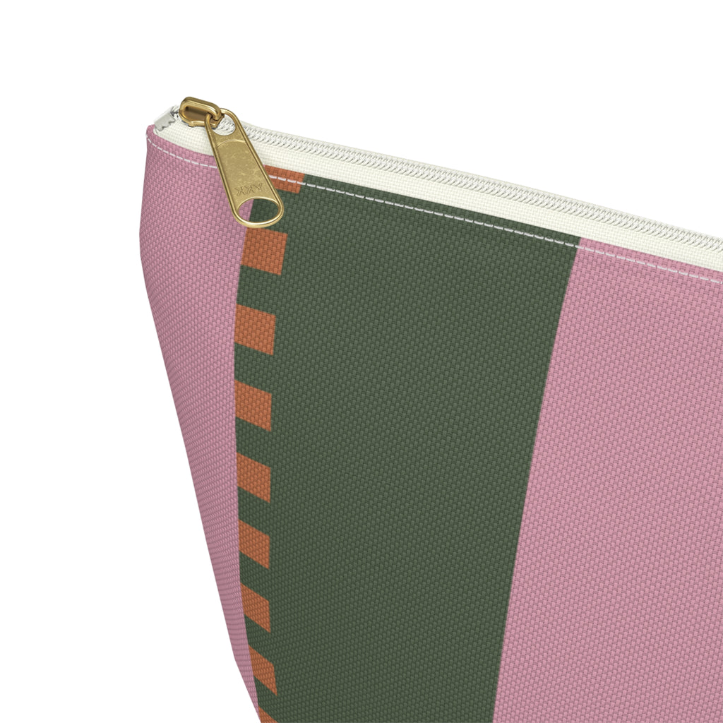 Close-up of the zipper and pink green stripes on the makeup bag