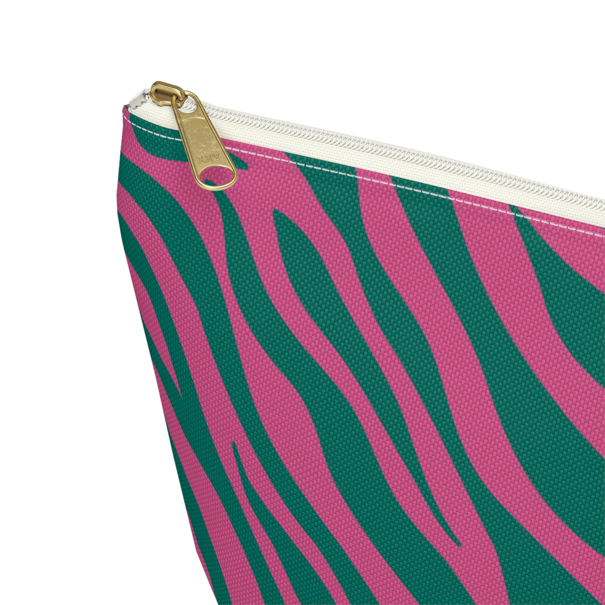 Close-up of the gold zipper pull and zebra stripes on the makeup bag