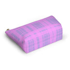 Pink plaid makeup bag seen from an angle on a white background