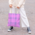 Model holding the pink lavender plaid tote bag by its handles