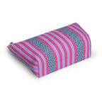Angled view of the striped makeup bag lying on its side