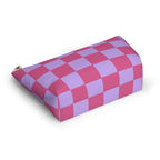 Pink purple checkered makeup bag lying on its side